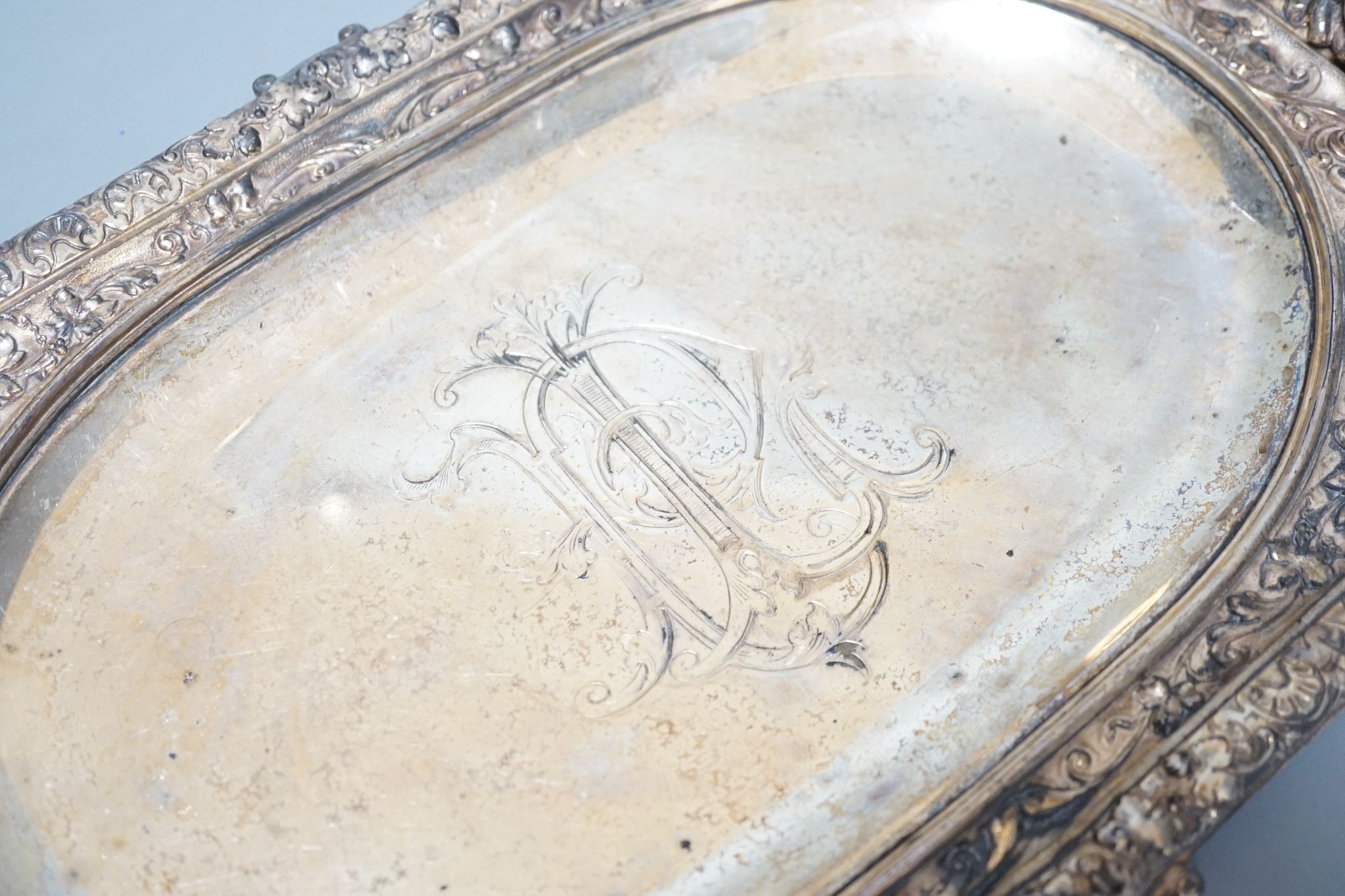 A Victorian cherub handled plated tray 40cm